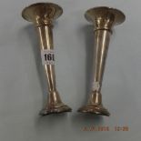 A pair of hallmarked silver posy vases