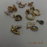Five pairs of 9ct gold earrings and three pendants all stone or cameo set,