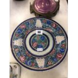 A glazed Majolica plate,