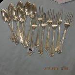 Seven Austrian silver spoons and forks approximately 1200 grams