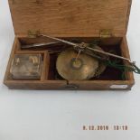 A boxed set sovereign scales and weights