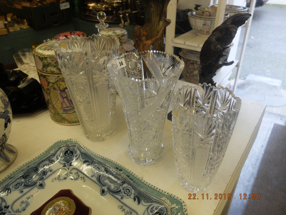 Three large cut glass vases