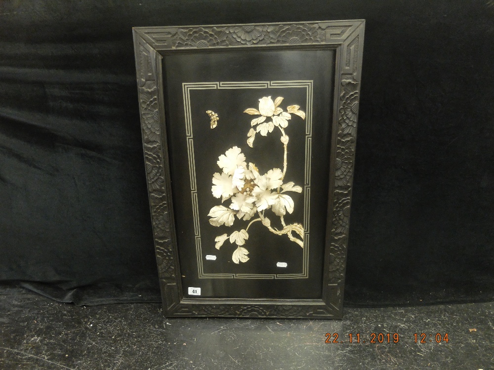 An oriental lacquered wall panel