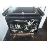 A vintage oriental black lacquered cocktail cabinet