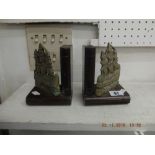 A pair of brass ships bookends