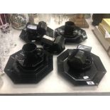 A black glass tea set