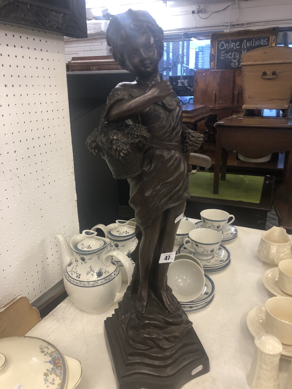 A bronze girl with basket - Image 2 of 2