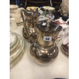 A pair of Victorian Elkington & Co silver plated water jugs