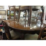 An extending dining table and six chairs