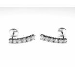 Paire de boucles d'oreilles or blanc pendantes serti griffes de 12 diamants ronds [...]