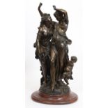 IMPORTANT GROUPE EN BRONZE "DEUX NYMPHES AU PUTTO" En bronze patiné, reposant sur [...]