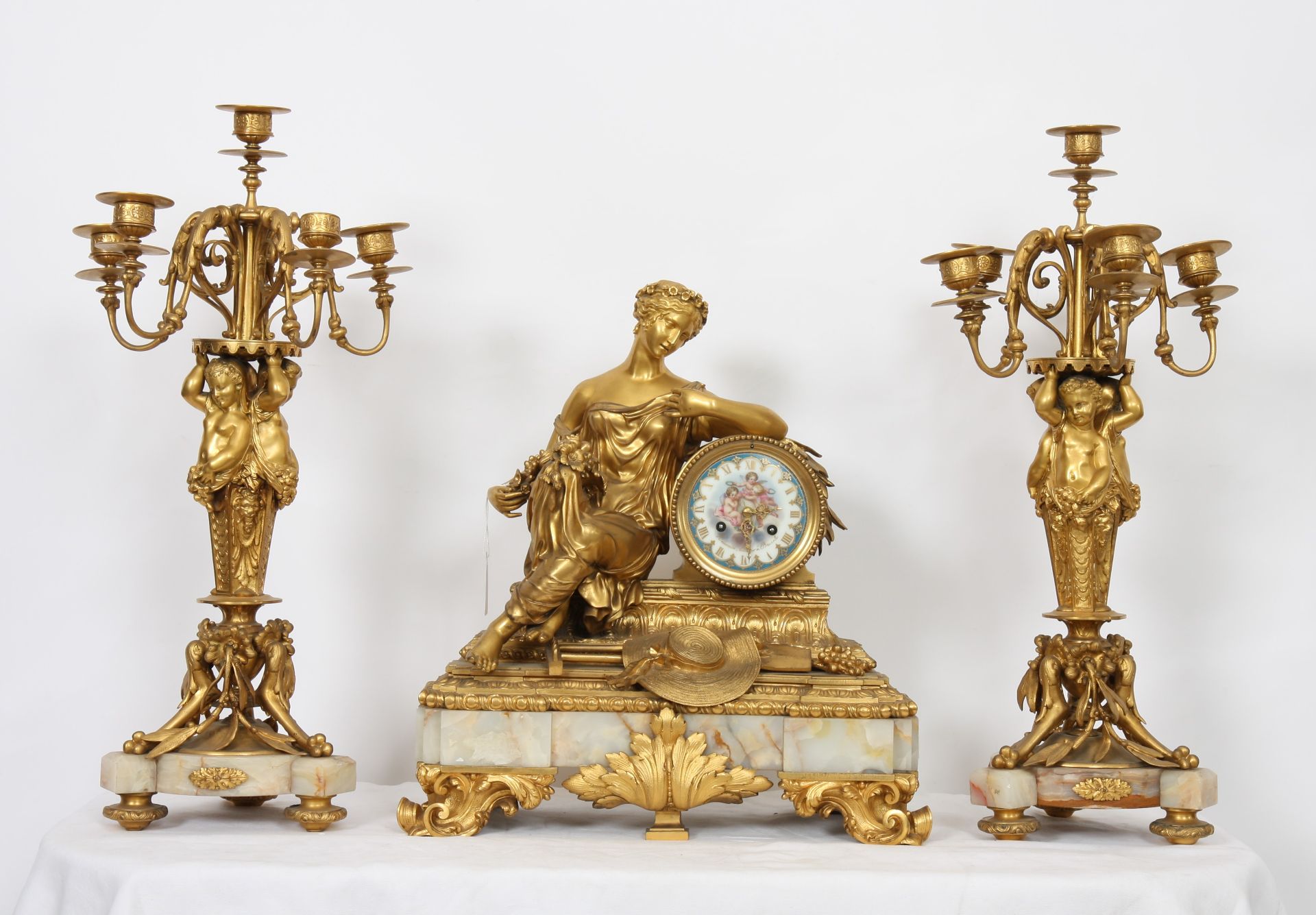 GARNITURE EN BRONZE DORE "A LA BELLE JARDINIERE" NAPOLEON III En bronze doré, marbre [...]