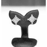 Paire de clous d'oreilles or blanc sertie de 18 diamants princes pour 0,80 c. env. en [...]