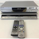 PANASONIC HARD DRIVE DVD RECORDERS/BOXING POSTERS - Two Panasonic DVD recorders with remotes and