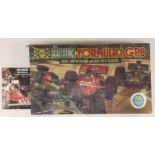 SCALEXTRIC FORMULA 1 GP8 BOXED - A boxed 1976 Scalextric GP8 set to include two controllers,