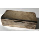 SILVER CIGARETTE BOX. A Walker & Hall silver cigarette box dating to 1953.