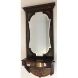 INLAID WALL MIRROR. An inlaid wall mirro