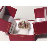 ELVIS PRESLEY PERSONALLY OWNED AND WORN DIAMOND AND RUBY 14K GOLD RING.