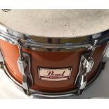 PEARL MAPLE SHELL SNARE. A Pearl Maple Shell snare drum with Remo skins, in hard case.