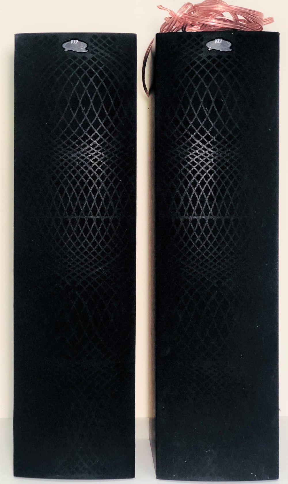 KEF Q35 SPEAKERS. A pair of Kef Q35 speakers, with some cabling.