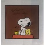 CHARLES SCHULZ. A mounted, printed image of Snoopy signed with inscription by Charles Schulz.