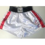 CASSIUS CLAY MUHAMMAD ALI SIGNED REPLICA BOXING SHORTS.