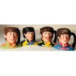 ROYAL DOULTON SGT PEPPER TOBY JUGS. Set of four 1984 Sgt Pepper toby jugs from Royal Doulton.