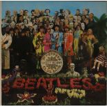 SGT PEPPER'S LONELY HEARTS CLUB BAND LP - ORIGINAL UK MISPRINT PRESSING (PMC 7027 OMITTING A DAY IN