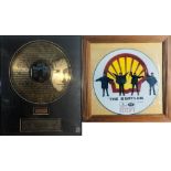 FRAMED GOLD IMAGINE AWARD AND PICTURE DISC.