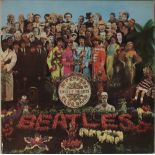 SGT PEPPER'S LONELY HEARTS CLUB BAND LP - ORIGINAL UK MISPRINT PRESSING (PMC 7027 OMITTING A DAY IN