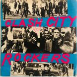THE CLASH SIGNED CITY ROCKERS SLEEVE.