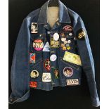 ELVIS BELT BUCKLES AND DENIM JACKET.