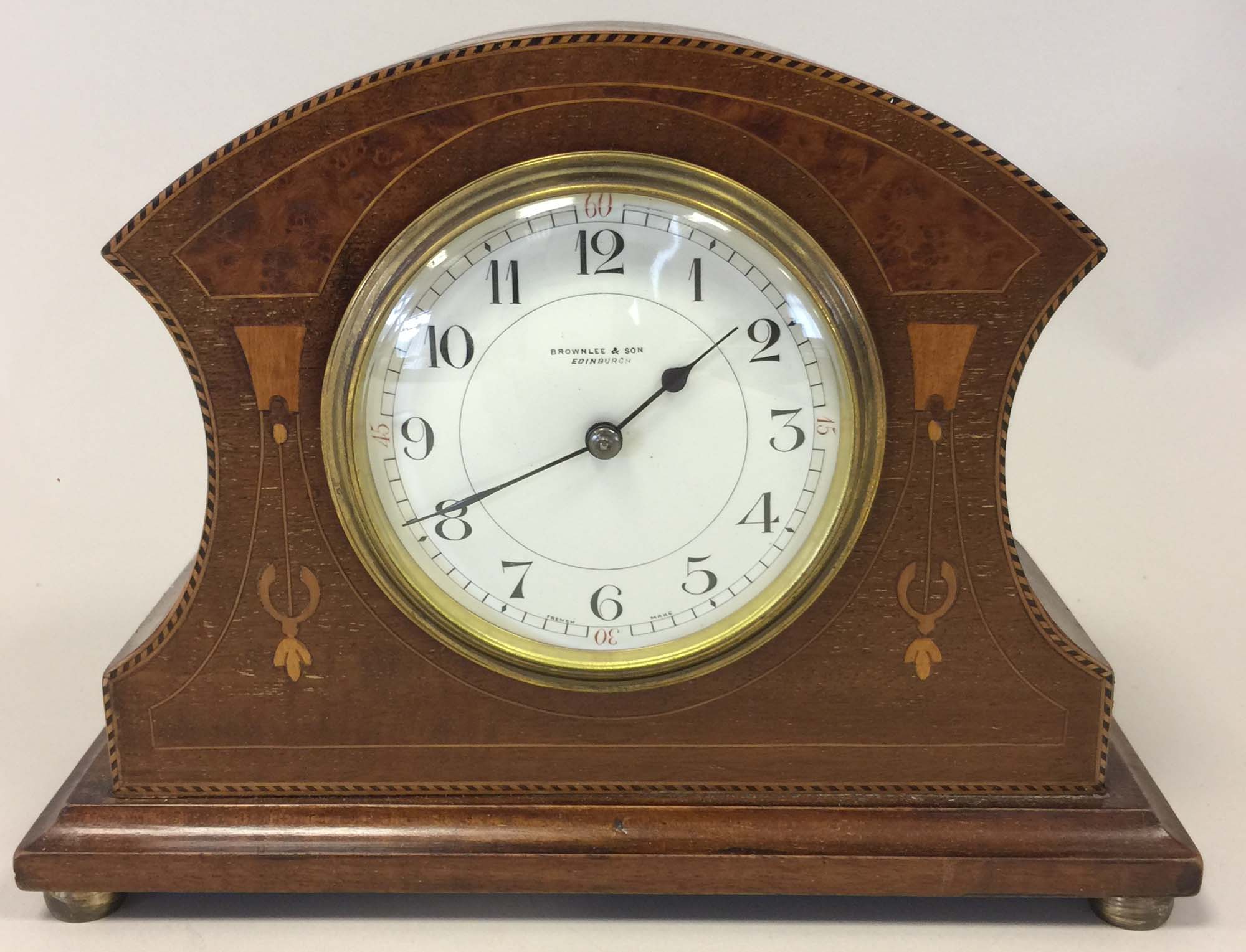 EDWARDIAN MANTLE CLOCK. A Brownlee & Son, Edinburgh inlaid mantle clock with French drum movement.