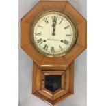 SETH THOMAS. A Seth Thomas octagonal drop-dial pendulum wall clock. Measures approx 50cm.