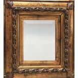 GILT FRAMED BEVEL EDGED MIRROR.