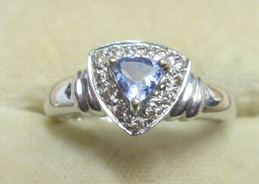 Modern white gold ring set with tanzanite size 57 3 g