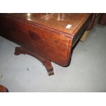 Victorian mahogany single drawer lap dining table with triform platform base