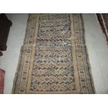 Antique rug : Belouche with blue ground 120 cms x 84 cms