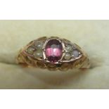 Early 20th century 9 ct gold ring set with seed pearls around single amethyst size 57,