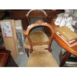 Pair of Edwardian carved walnut sidechairs