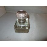 Early 20th century unmarked silver metal topped inkwell
