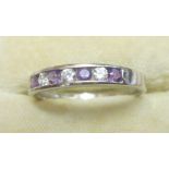 Modern 9 ct white gold semi eternity ring set with amethyst and CZ size 55, 1.