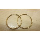 Pair of 9 ct gold hoop earrings 1.