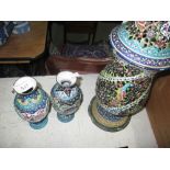 Pair of antique Islamic painted and enamelled vases 18 cms with one similar larger vase 40 cms