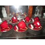 Set of six Carlton ware Rouge pattern coffee cups and saucers