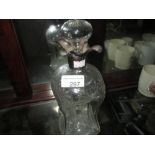Silver rimmed glass decanter