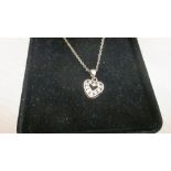 Modern 9 ct gold heart shape pendant on gold necklace in presentation box 1.