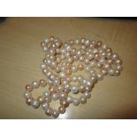 String of two coloured pearls