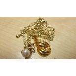 2 x 9ct gold necklaces : one with scrolling pendant the other set with pearl pendant 6 .