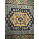 20th century blue ground machine rug 155 cms x 90 cms